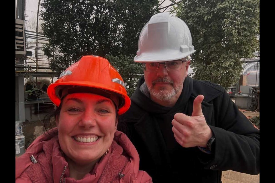 Coun. Shelby Ch'ng takes a tour of the Thunder Bay Botanical Conservatory lead by Guy Walter. (Shelby Ch'ng/facebook)