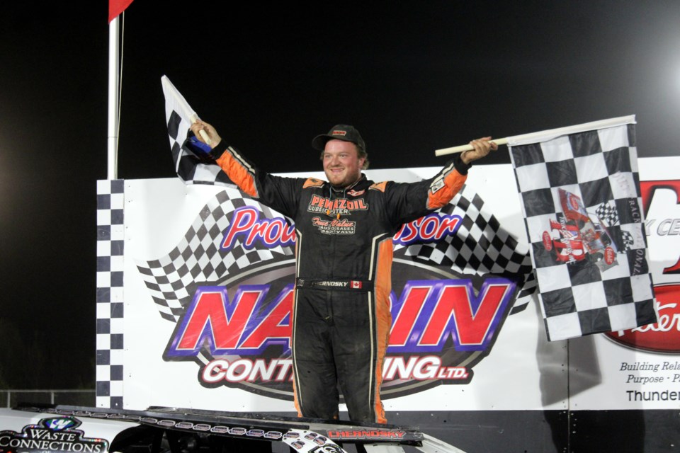 Cole Chernosky celebrates after winning a Super Stock feature at the Thunder Bay Truck Centre Dirt Track Nationals on Sept. 21.