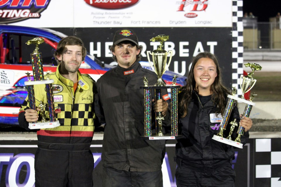 Jimmy Owen, left, his cousin Jesse and his twin sister Selena swept the podium in the Hornets feature during the 2024 Thunder Bay Truck Centre Dirt Track Nationals at Thunder City Speedway on Saturday night.