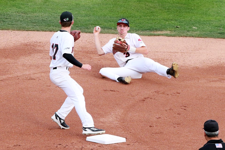 Thunder Bay's Porter Jorgenson (3) makes a diving stab to complete the out at second with shortstop Karson Krowka on Friday, Aug. 4, 2023. (Leith Dunick, tbnewswatch.com)
