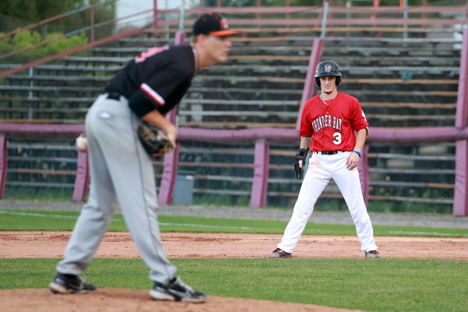 Thunder Bay's Travis Chestnut studies Mankato starter Caleb Strack on Sunday, July 16, 2023 at Port Arthur Stadium. (Leith Dunick, tbnewswatch.com)