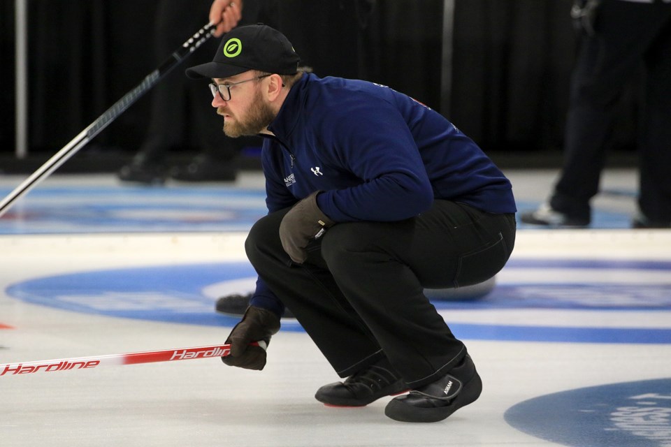 Zach Warkentin watches a shot on Tuesday, Jan. 21, 2025 at the Nothern Ontario Men's Curling Championship at the Port Arthur Curling Centre. (Leith Dunick, tbnewswatch.com)