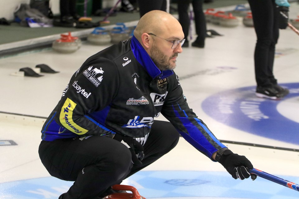 Trevor Bonot calls a fourth-end shot in Draw 11 action on Saturday, Jan. 25, 2025 at the Northern Ontario Men's Curling Championship at the Port Arthur Curling Centre. (Leith Dunick, tbnewswatch.com)