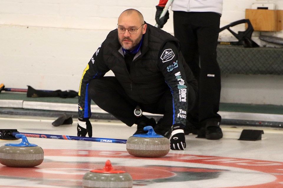 Trevor Bonot surveys the house during Tbaytel Major League of Curling on Sunday, Dec. 1 at Port Arthur Curling Centre. (Leith Dunick, tbnewswatch.com)