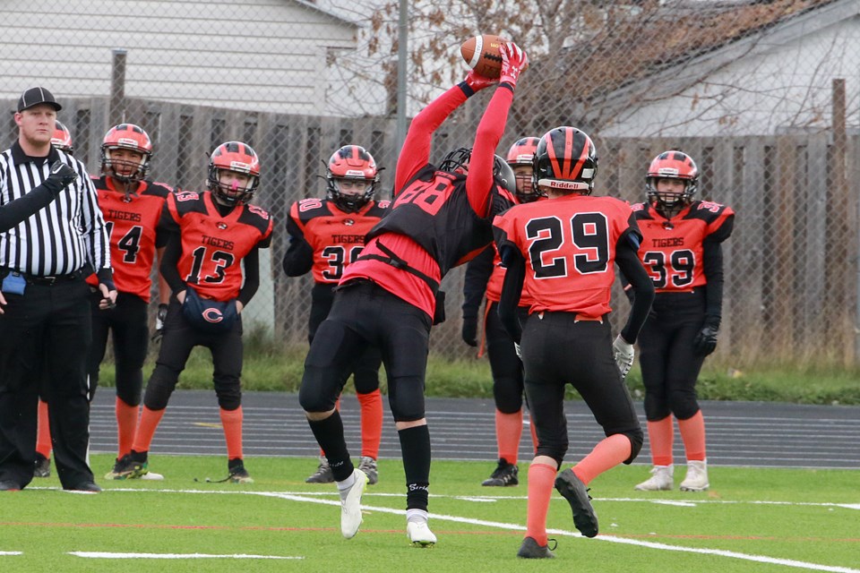 St. Ignatius receiver Matteo Przysucha comes down with a big catch on Sunday, Oct. 29, 2023 against the Westgate Tigers in the SSSAA junior football semifinal, a game won by the Falcons 45-7. (Leith Dunick, tbnewswatch.com)