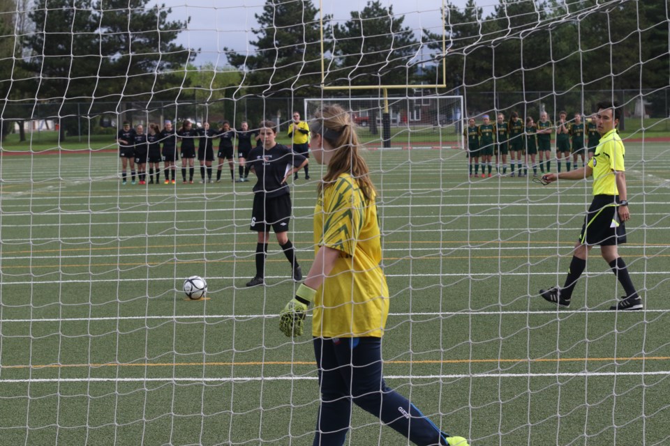 Maeve Pylypchuk stares down Erin Szturm during the first round of penalty kicks. (Michael Charlebois / tbnewswatch)