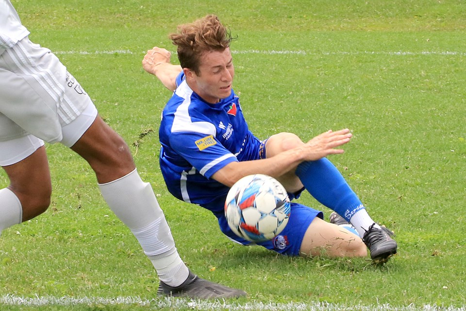 Thunder Bay's Karim Bachir Bey slides after a ball on Sunday, July 7, 2024. (Leith Dunick, tbnewswatch.com)