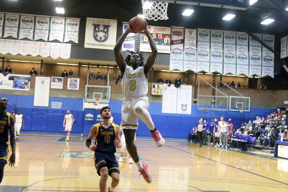 Michael Okafor powers up for the first-quarter dunk on Friday, March 4, 2022 against the Windsor Lancers. (Leith Dunick tbnewswatch.com)