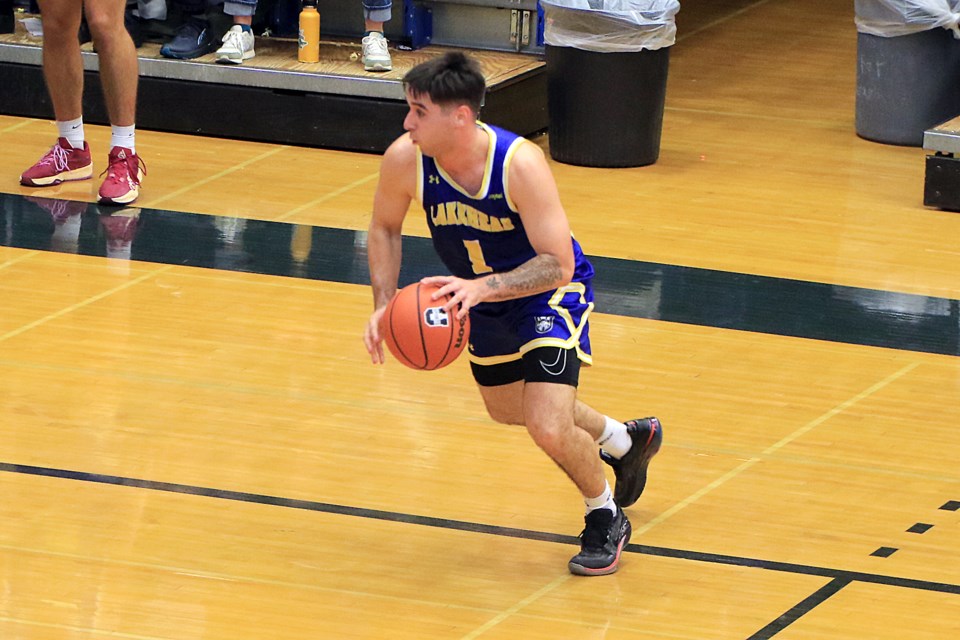 Chris Sagl gets set for his game-winning three-pointer on Saturday, Nov. 2, 2024, against the McMaster Marauders. (Leith Dunick, tbnewswatch.com)