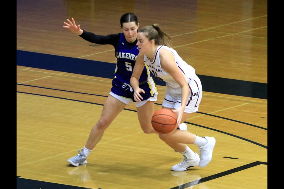 Lakehead's Ally Burke (left) guards McMaster's Emily Frankovic on Saturday, Nov. 2, 2024 at the C.J. Sanders Fieldhouse. (Leith Dunick, tbnewswatch.com)