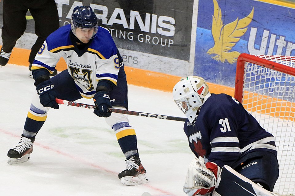 Lakehead's Justin Paul (left) scored twice to lead the Thunderwolves past Sebastian Resar and the Toronto Varsity Blues on Saturday, Oct. 5, 2024 at Fort William Gardens. (Leith Dunick, tbnewswatch.com)