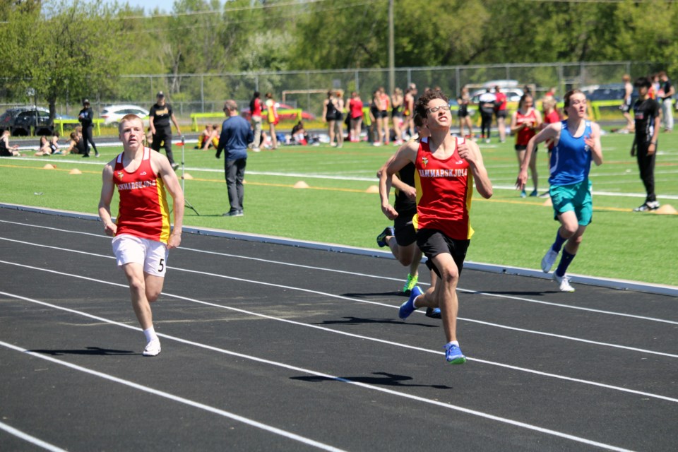 Hammarskjold's Jason Turek speeds down the track on his way to winning the gold medal in the novice boys' 200-metre dash at the NWOSSA track meet on Wednesday.