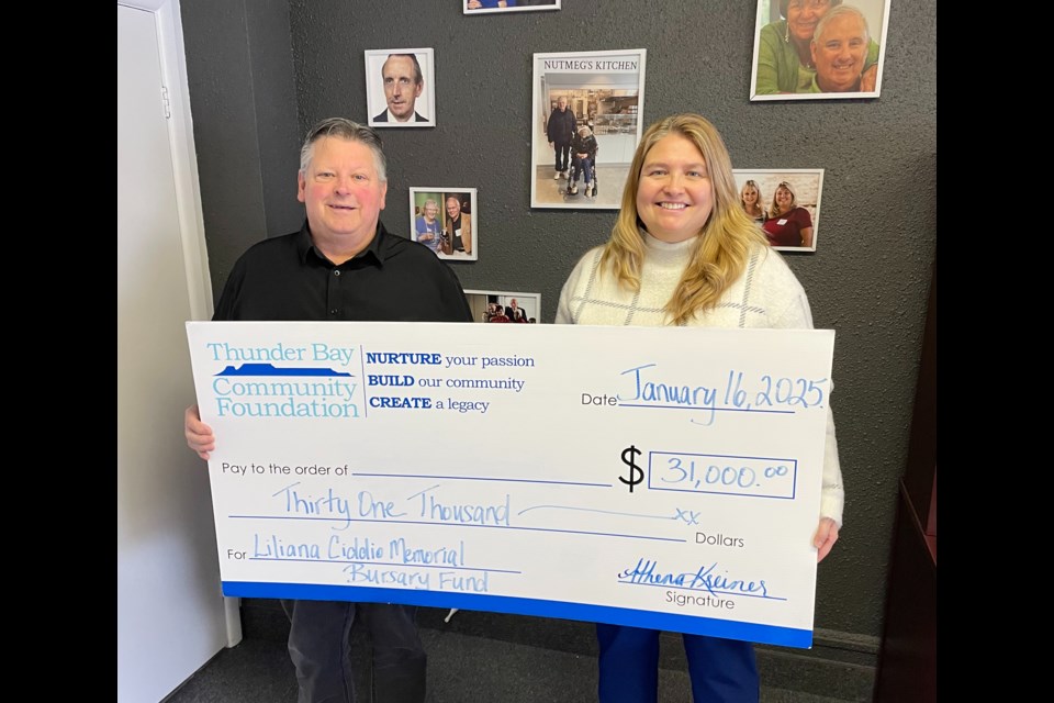 Robert Lorkowski, left, and Athena Kreiner, CEO of the Thunder Bay Community Foundation