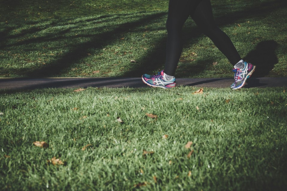 woman-walking-trail