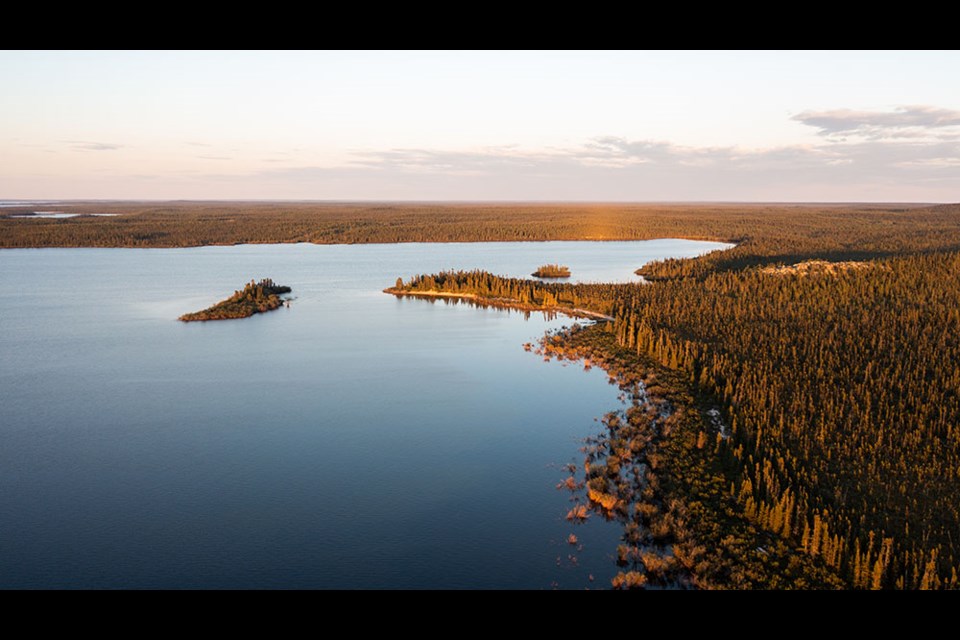 An aerial photo of the boreal forest and Shethanei Lake near Sayisi Dene First Nation in Northern Manitoba.