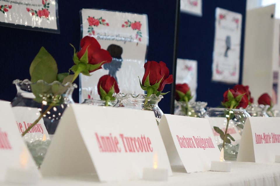 Displays at a Thompson event for the National Day of Remembrance and Action on Violence Against Women on Dec. 6 remember 14 women killed at their university in Montreal in 1989 as well as four Manitoba women believed to have been the victims of a serial killer in Winnipeg.