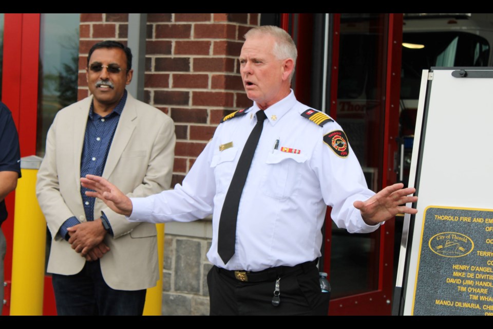 Thorold Fire Chief Terry Dixon speaks at the official opening of the fire department's new station on McCleary Drive. The new facility replaces the ageing and inadequate former Station No. 1 on Towpath Street. Looking on in Chief Administrative Officer Manoj Dilwaria.