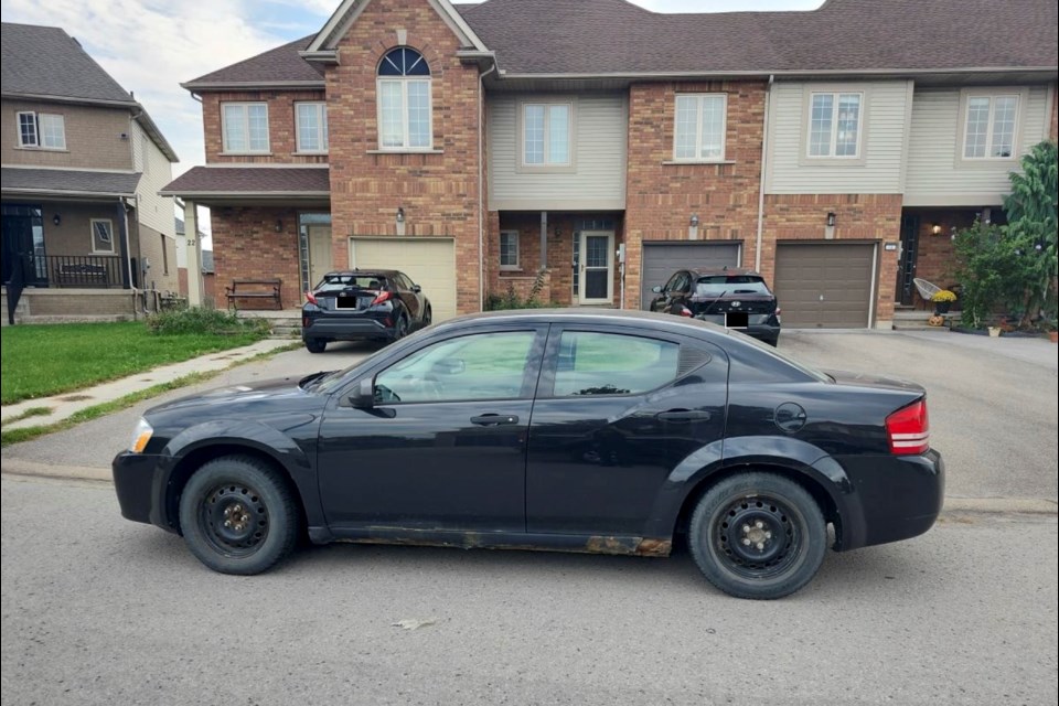 The car right before it was towed, in a picture taken by the city's by-law department.