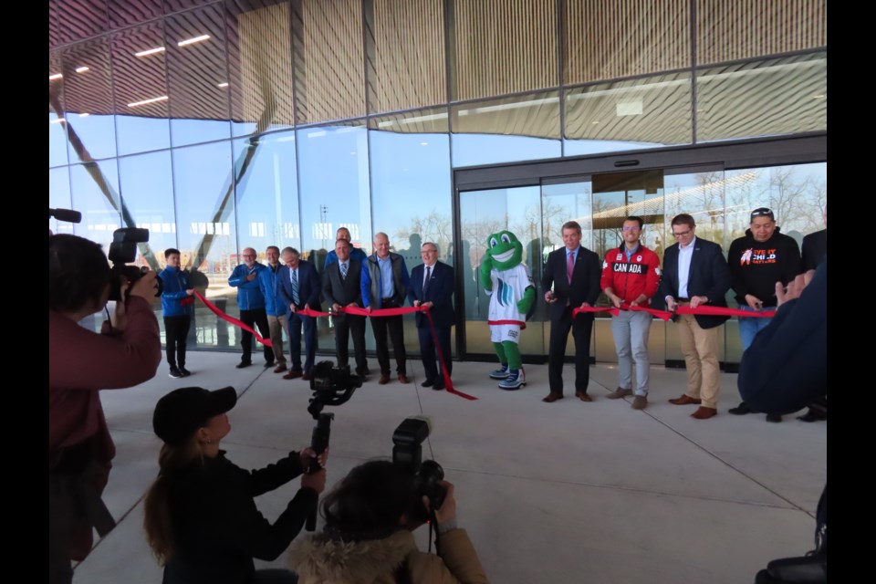 Niagara's dignitaries, including Niagara Region Chair Jim Bradley, Thorold Mayor Terry Ugulini and St. Catharines counterpart Walter Sendzik all cut pieces of the red ribbon.