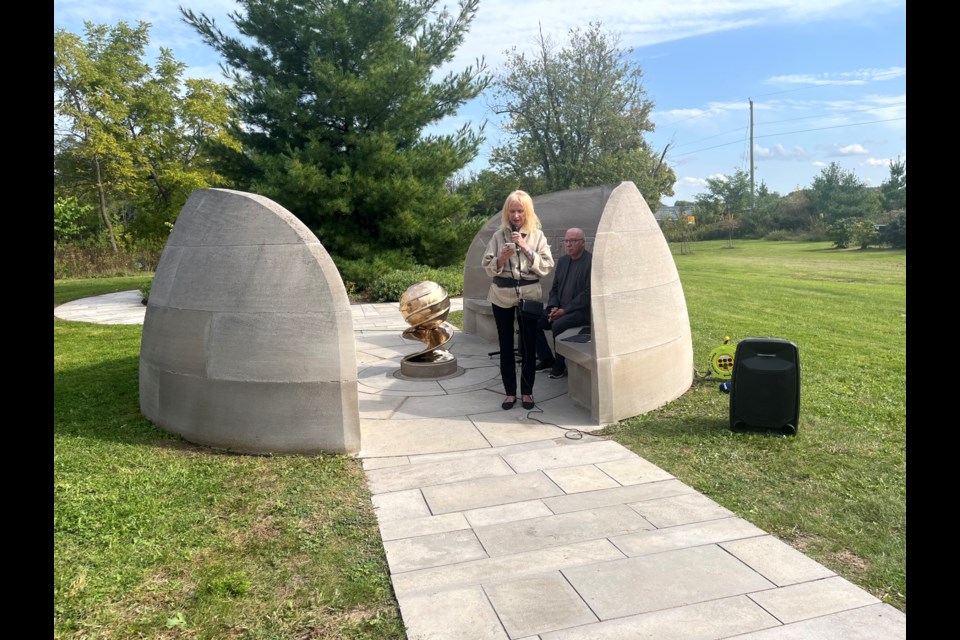 The president of the Friends of Laura Secord, Caroline McCormick, during the unveiling of the new sculpture in the First Nations Peace Monument.