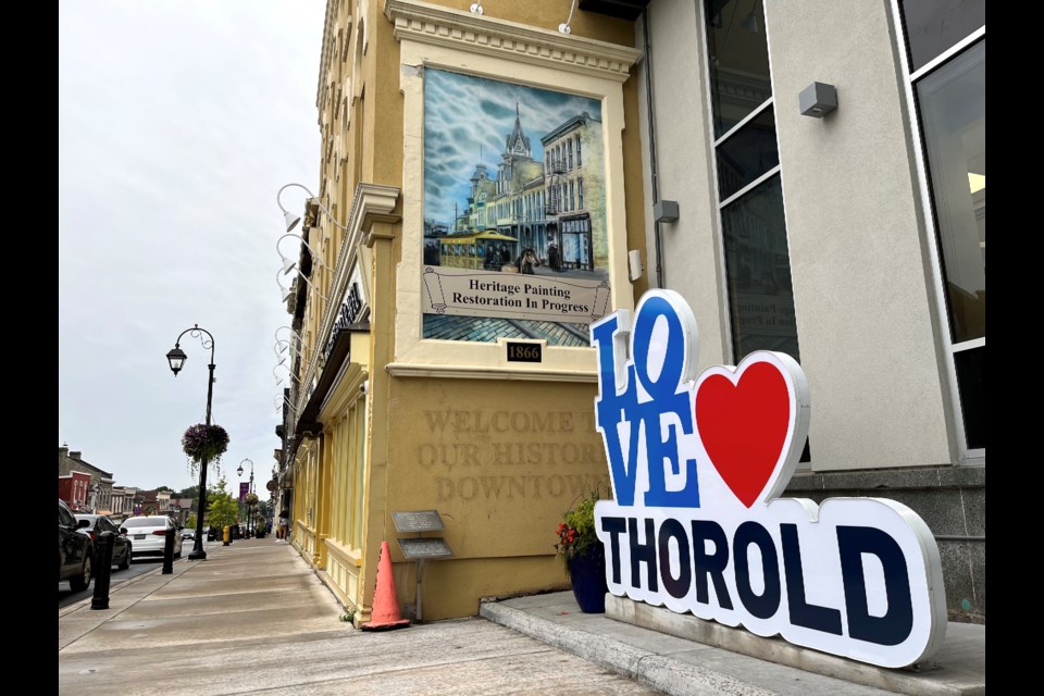 The city is restoring the Front Street mural to its former glory.