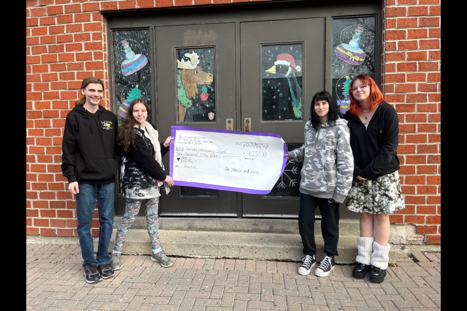 Thorold Secondary students Travis Adams-Lane, Shantell Elshoff, Jay Franklin, Riley Pitz-Agnew and Sara Bilal (not pictured) have given the windows of the Moose and Goose a Christmas makeover.