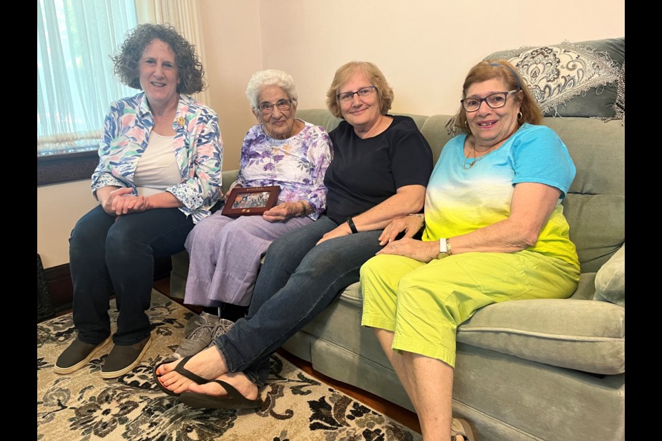 Susan Zill, Helen Pullen, Judy Sutton and Christine Cook gathered at 35 Pine Street South to say goodbye to an era.