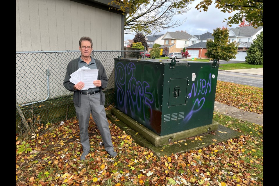 Ted Mansell with the letters he has sent to the candidates in the upcoming election.