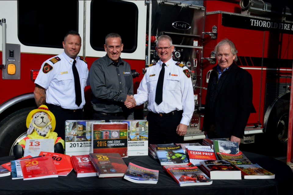 From left to right: Deputy Chief Mike DeGasperis, Enbridge Gas Representative Henry Timmers, Chief Terry Dixon, Mayor Terry Ugulini.