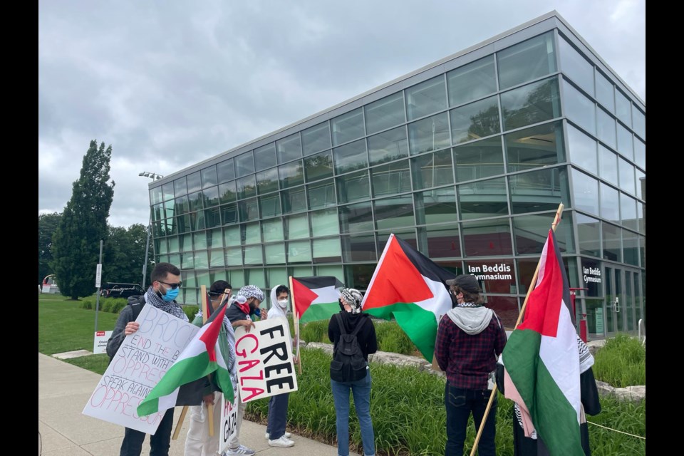 Protest at Brock University convocation on Monday.