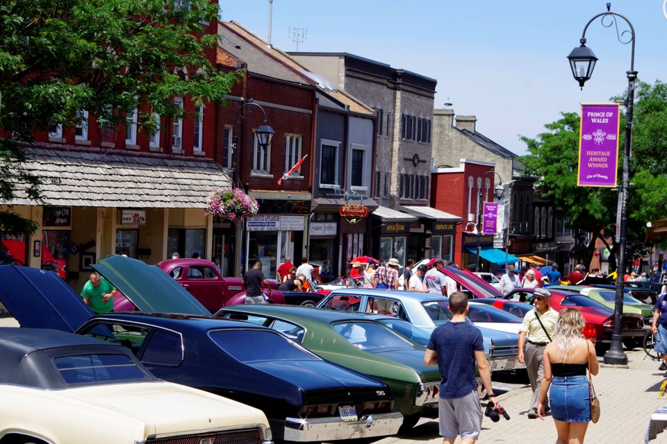 The new Prince of Wales Heritage flags above Front Street added to the colour and vibrance of the 2019 BIA Car Show. Bob Liddycoat / Thorold News