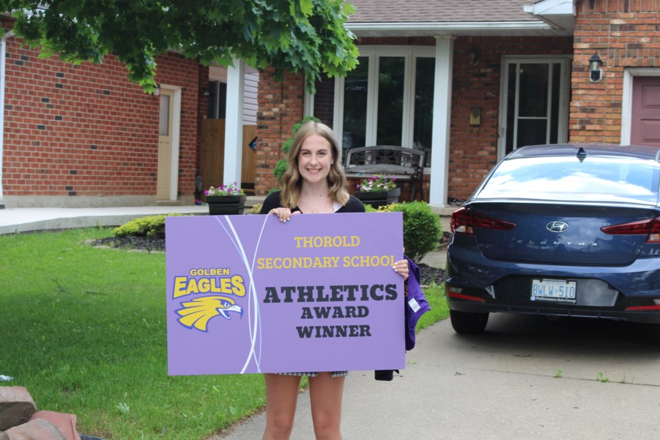 Madi McCallum, TSS Senior female athlete of the year with coach Andrew Robertson. Photo: Supplied