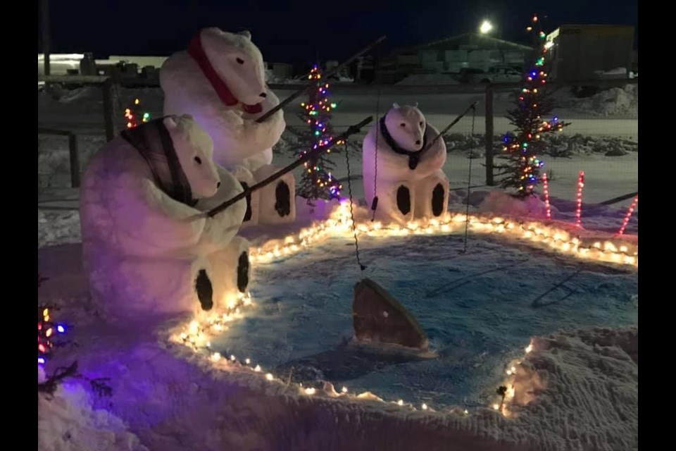 First place in Attawapiskat's annual snow sculpture contest went to George Koostachin whose sculpture was of three polar bears ice fishing. Supplied photo