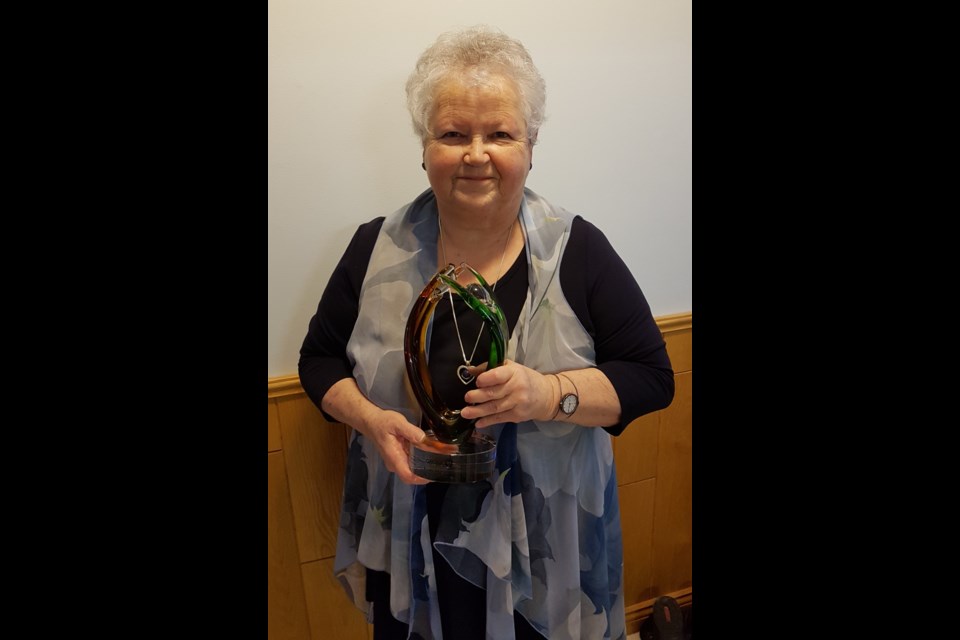 Réjeanne Bélisle-Massie holds the June Callwood Award. Supplied photo