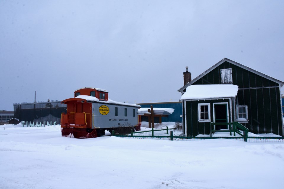 The Timmins Museum: NEC on Second Avenue in February 2025. A Hollinger House and Ontario Northlander caboose are part of the exhibits on the property.