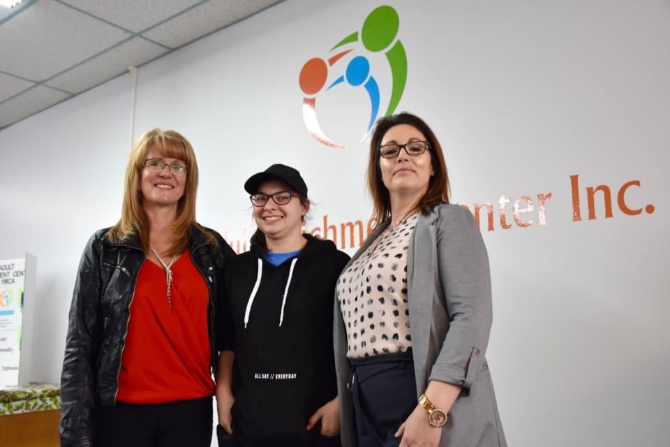 Adult Enrichment Center executive director Carmelle Bernier, user Samanta Leblanc, and founder Joanne Bouchard at the grand opening of the Timmins location. Maija Hoggett/TimminsToday