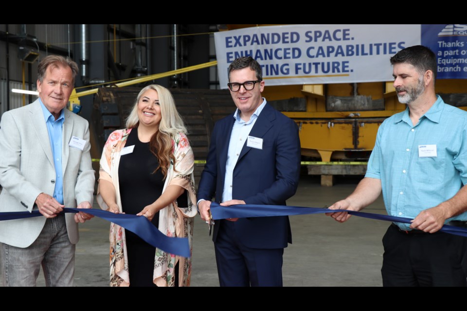 Timmins MPP and minister of mines George Pirie, Mattagami First Nation Chief Jennifer Constant, SMS Equipment president and CEO Robin Heard, and Timmins City Councilor Rock Whissell cut the ribbon at the new SMS Equipment Facility.