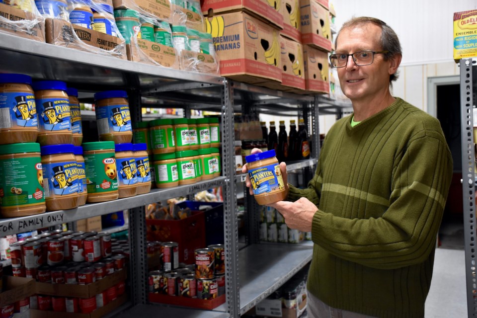 South Porcupine Food Bank treasurer Peter Davis with some of the items in need. Maija Hoggett/TimminsToday