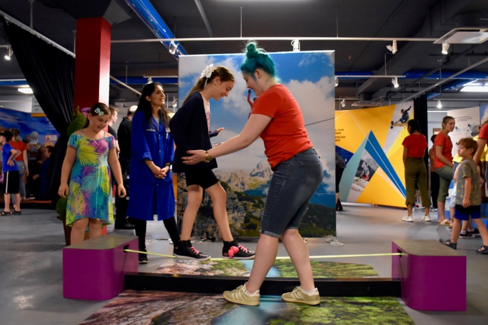 The slack line is one of the most popular interactive exhibits at Beyond Human Limits, which is on display at Science Timmins until Aug. 17. Maija Hoggett/TimminsToday