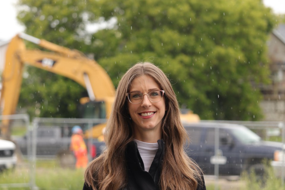 Michelle Boileau at the La Ronde site as construction of the new building started.