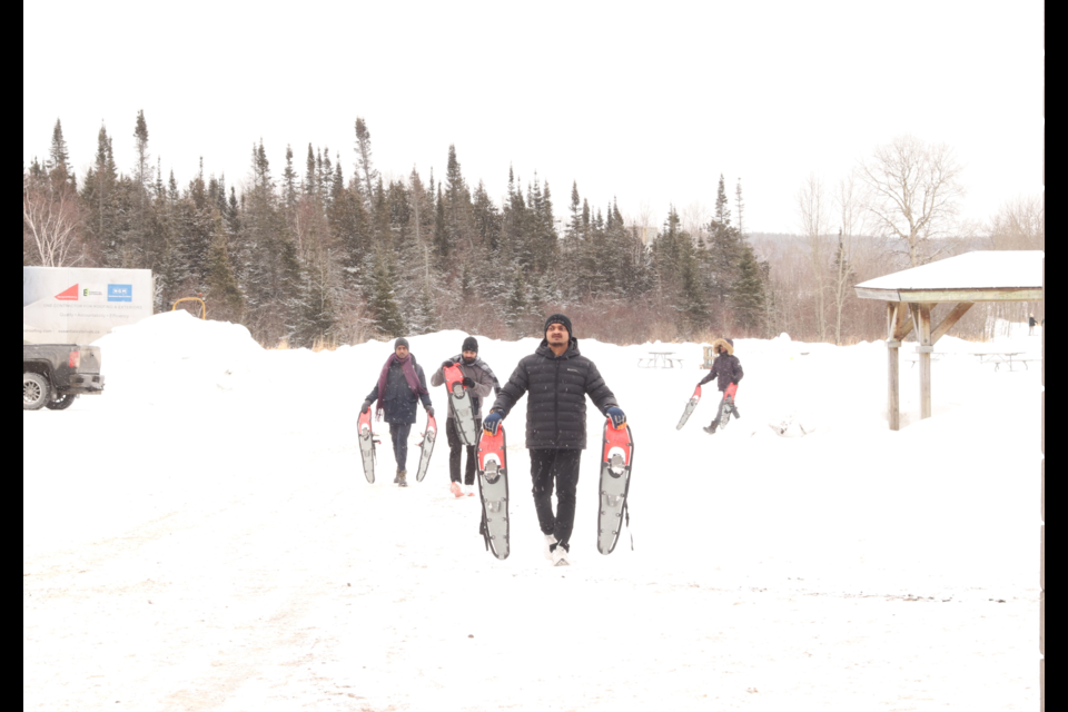 Students returning from their first snowshoeing experience at Northern College.