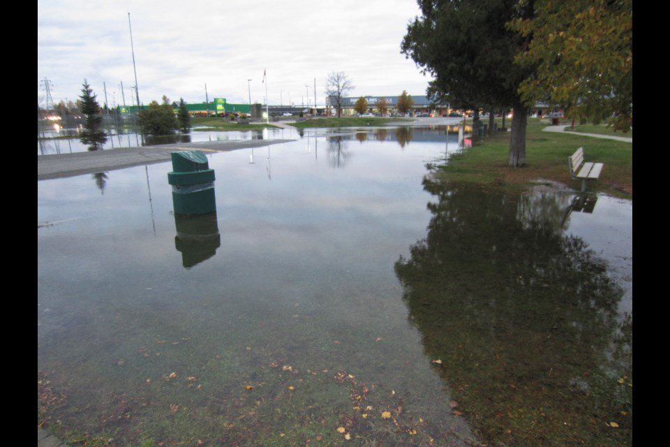 A trash can became an island on Thursday evening. Andrew Autio for TimminsToday                               