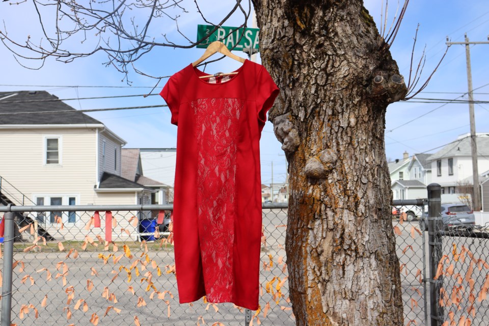 A red dress hung up at the Timmins Native Friendship Centre to commemorate National Day of Awareness for Missing and Murdered Indigenous Women, Girls and Two-Spirit (MMIWG2S) people.