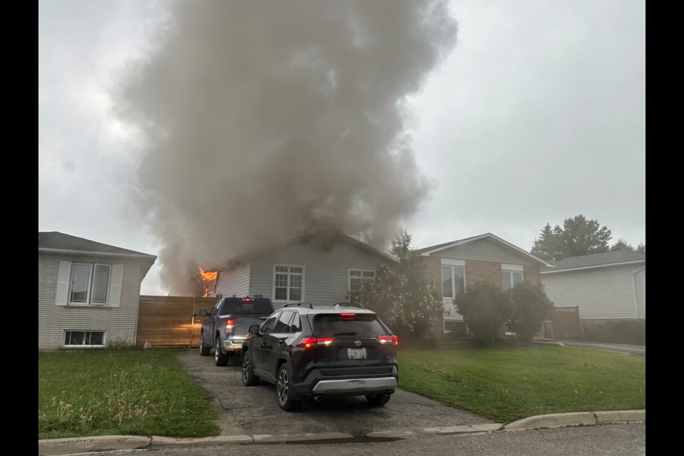 A house fire on Renee Place in Timmins before crews arrived on scene.