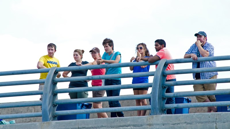 Michael Joseph (Centre) and his team of volunteers wait patiently for the moment to release the ducks.