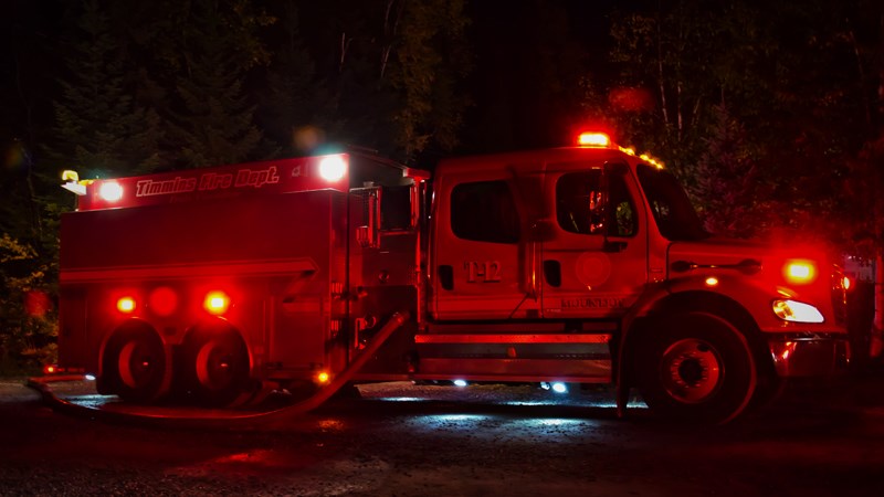 Crews from the Timmins Fire Department, Mountjoy Station fight to put out the flames at a property on Little Star Lake Road. Dave Kramer/ TimminsToday