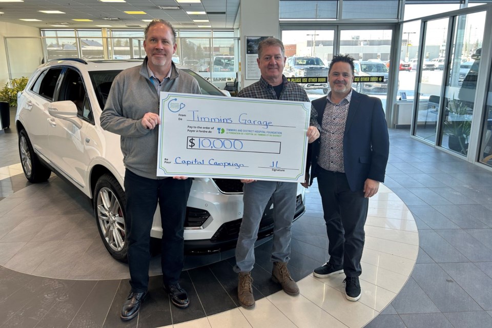 Timmins and District Hospital Foundation capital campaign director Dave McLaughlin, Timmins Garage owner Jim Mascioli, and Stefano Lodovici.