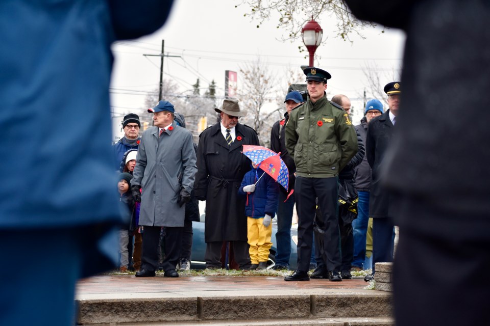 Hundreds of people braved the rain and cool temperatures for the Timmins Legion's annual Remembrance Day ceremony at the cenotaph in Hollinger Park.