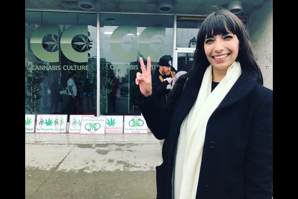 Jodie Emery stands outside of a Cannabis Culture store in Ottawa which opened in February