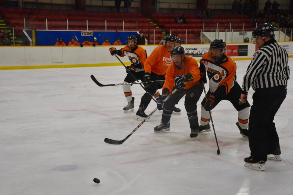 The Timmins Flyers Midget A hockey team faced off against members of the South Porcupine OPP, Timmins Police, and firefighters for an annual charity game. The event was to raise money for two-year-old Lydia Allard, who is also known as Liddybug. To raise cash, people gave a donation to get into the game, and there was a 50/50 draw, prize table, silent auction with NHL jerseys, and a door prize. Maija Hoggett/TimminsToday